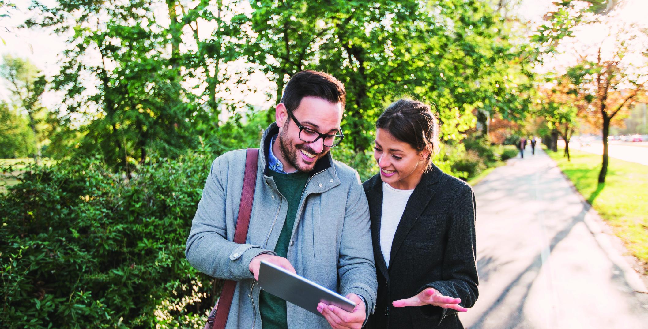 Two people discussing wealth management